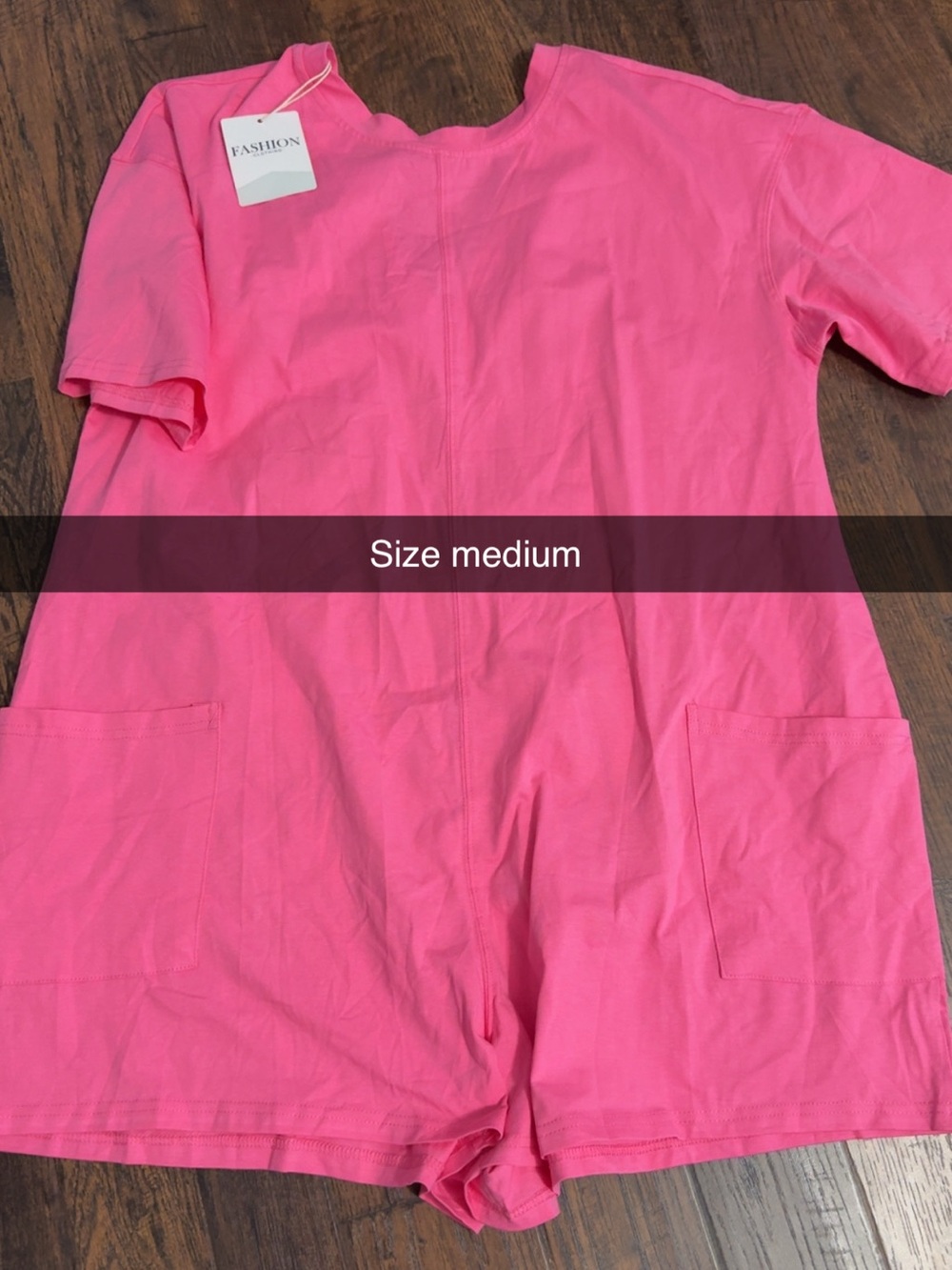 Women’s pink T-shirt romper size medium
